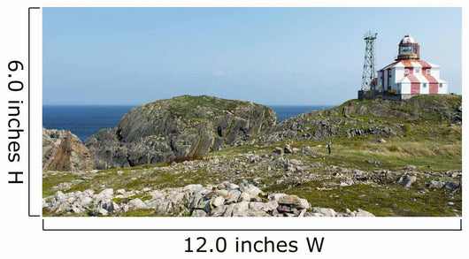 Lighthouse and building along the atlantic coast Wall Mural