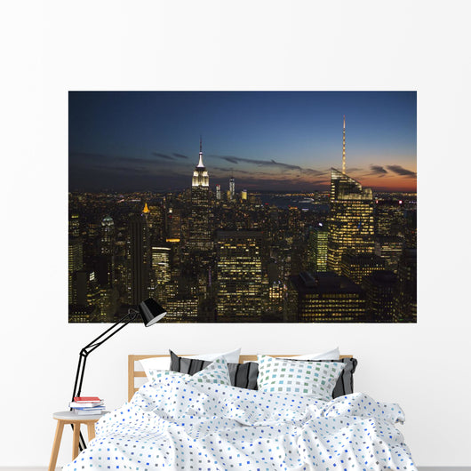 New York City buildings illuminated at nighttime Wall Mural