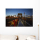 Pedestrian path on Brooklyn Bridge heading into Manhattan at night Wall Mural