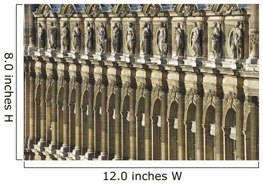 Ornate facade of a building with columns and statues of men in a row Wall Mural