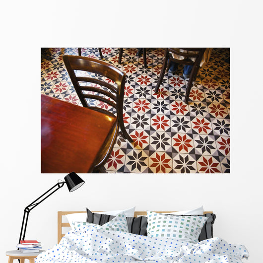 Decorative black and white pattern on the flooring of a restaurant Wall Mural