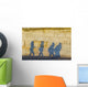 Shadows of pedestrians cast on a wall Wall Mural