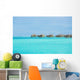 Over-water bungalows at a tropical resort Wall Mural