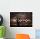 Silhouette of bare tree against sunset Wall Mural