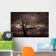 Silhouette of bare tree against sunset Wall Mural