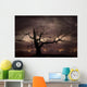 Silhouette of bare tree against sunset Wall Mural