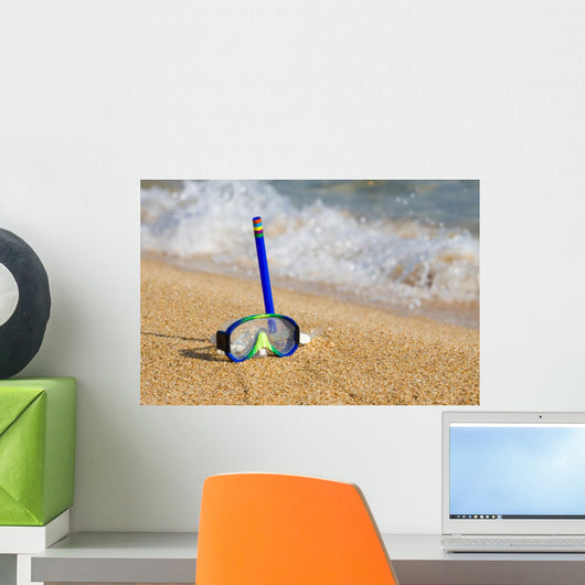 Tube and mask for a scuba diving on seacoast with a pebble Wall Mural