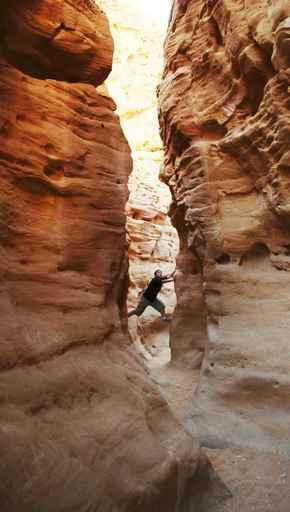 Girl Climbing Canyon Walls Wall Decal