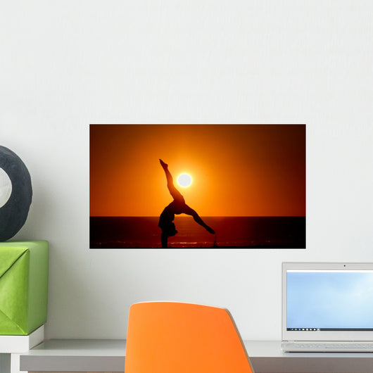 sunset silhouette gymnast on beach Wall Mural
