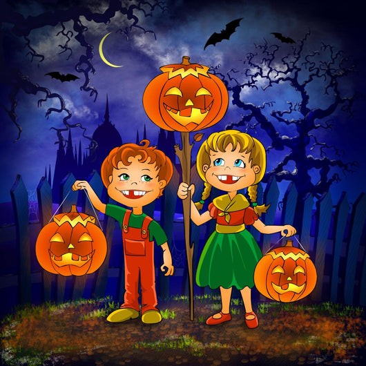Boy and girl with pumpkins celebrates halloween. Wall Mural