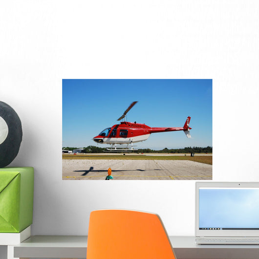 Red Helicopter Hovering above