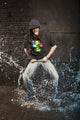 Hip-hop dancer in aqua studio showin his tongue Wall Mural