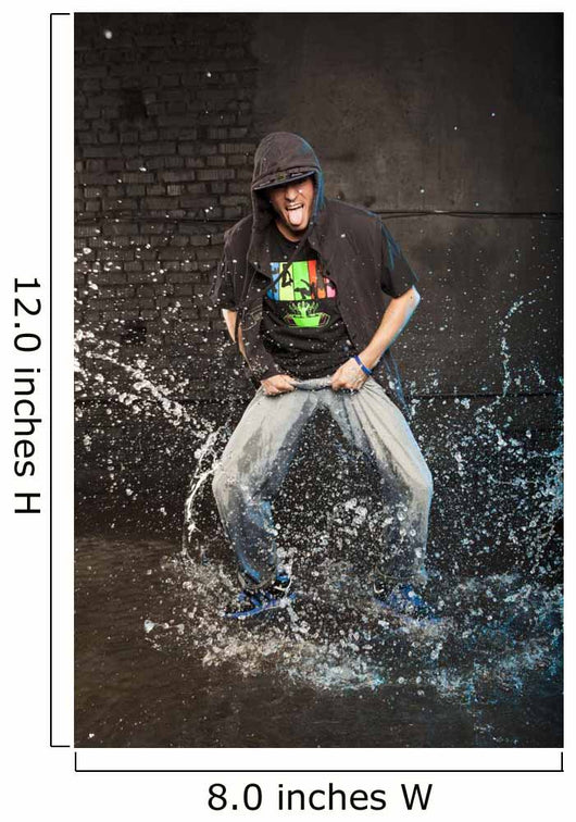 Hip-hop dancer in aqua studio showin his tongue Wall Mural