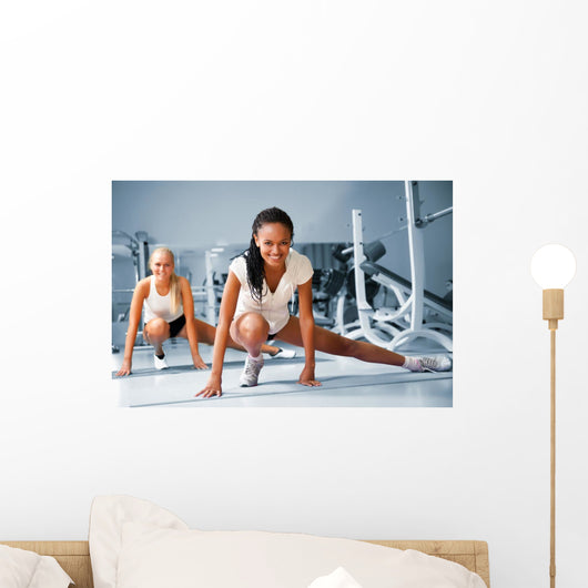 Two woman at the fitness club Wall Mural