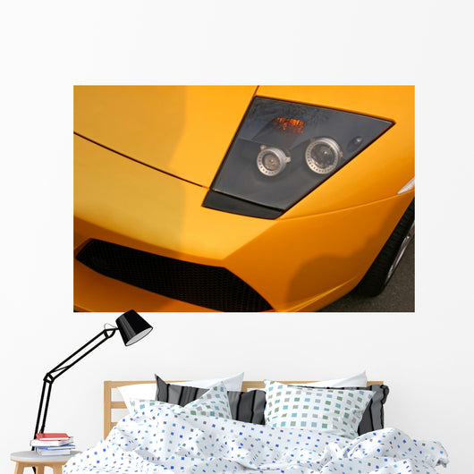 yellow supercar headlight Wall Mural