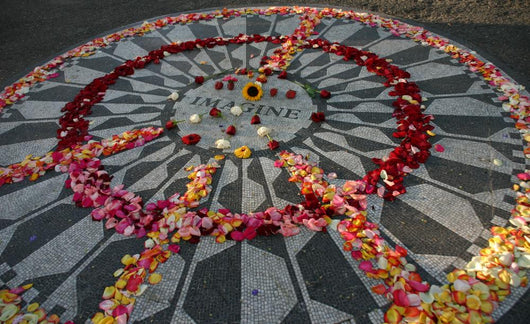 Imagine Monument With Flowers in Peace Sign Wall Mural