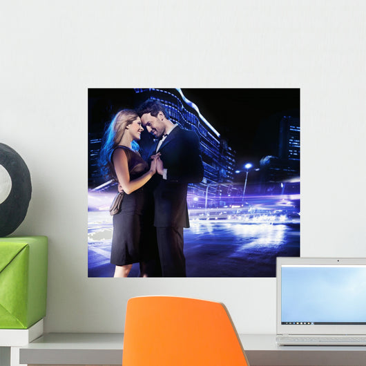 Handsome young couple dancing on the street and smiling Wall Mural