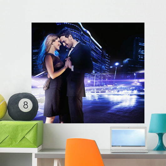 Handsome young couple dancing on the street and smiling Wall Mural