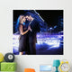 Handsome young couple dancing on the street and smiling Wall Mural