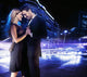 Handsome young couple dancing on the street and smiling Wall Mural
