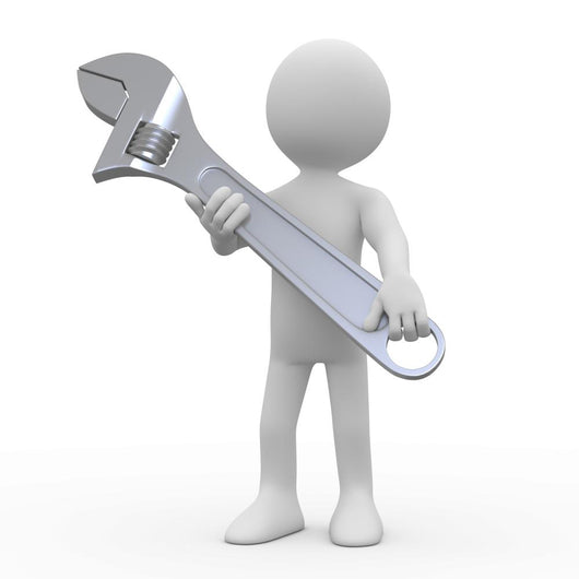Man with a huge adjustable spanner Wall Decal