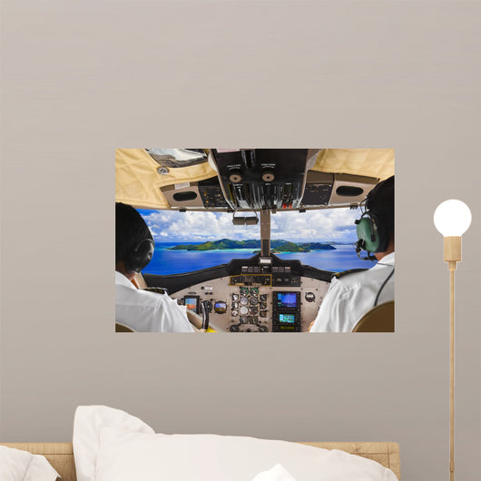 Pilots in the plane cockpit and island Wall Mural