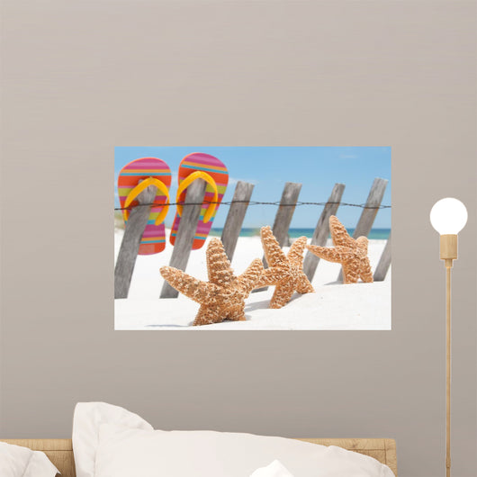 starfish by flip flops Wall Mural