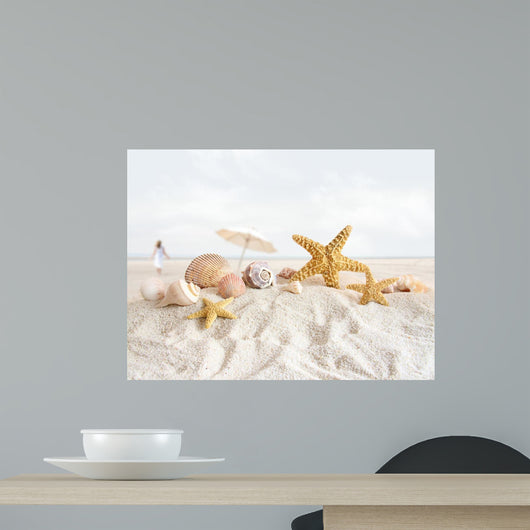 Starfish and seashells at the beach Wall Mural