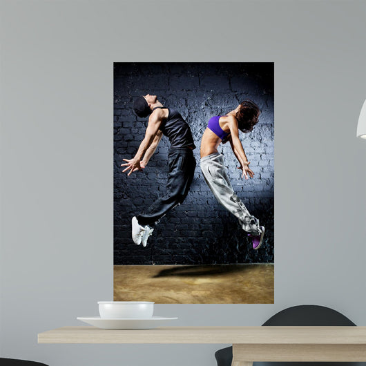 Young Dancer Couple Jumping