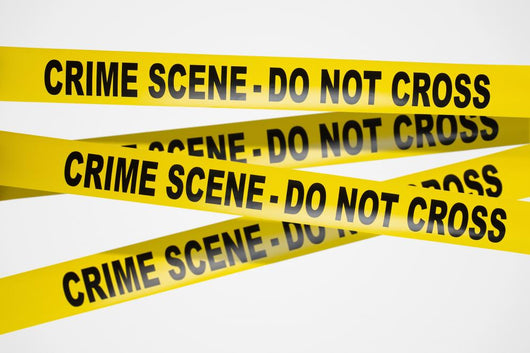 Yellow Crime Scene Tape on White Background Wall Decal