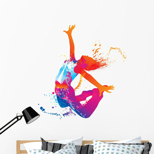 The dancing girl with colorful spots and splashes on white Wall Decal