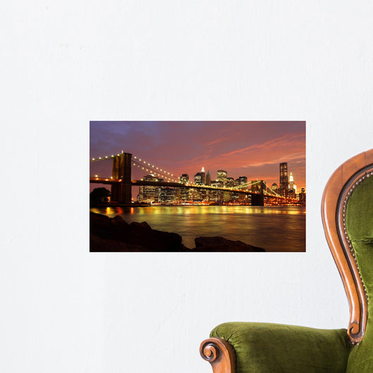 Brooklyn Bridge with city skyline at night Wall Mural