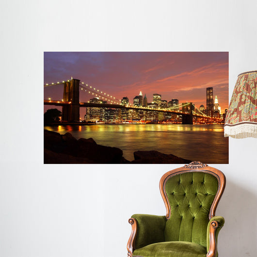 Brooklyn Bridge with city skyline at night Wall Mural