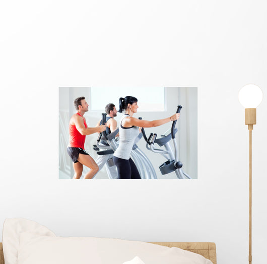 Man And Woman on Exercise Equipment Wall Decal