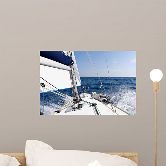 Speed sailing yacht in the sea Wall Mural