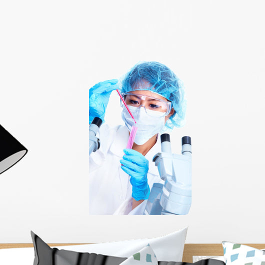 Scientific woman working in laboratory. Wall Decal