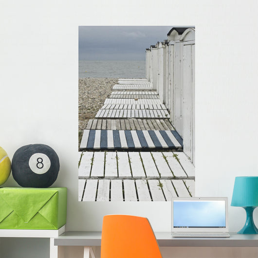 Beach huts to the harbor Wall Mural