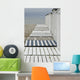 Beach huts to the harbor Wall Mural