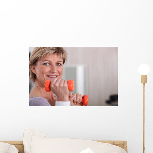 Mature Woman Using Dumbbells Wall Decal