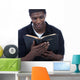 Young Black Man Reading