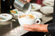 Barista Prepares Cappuccino His