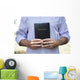 Man Holding Black Bible