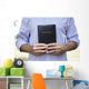 Man Holding Black Bible