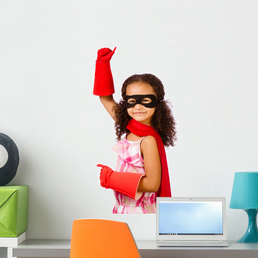 Portrait of pretty mixed race girl playing super hero Wall Decal