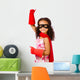 Portrait of pretty mixed race girl playing super hero Wall Decal