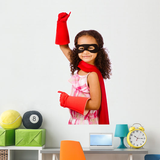 Portrait of pretty mixed race girl playing super hero Wall Decal