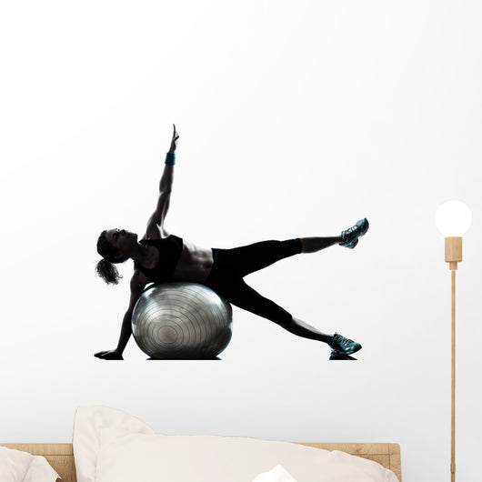 Woman Exercising Fitness Ball