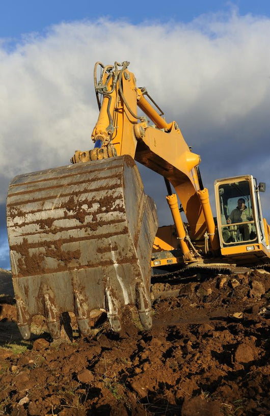 Big Excavator Working Mountain