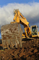 Big Excavator Working Mountain