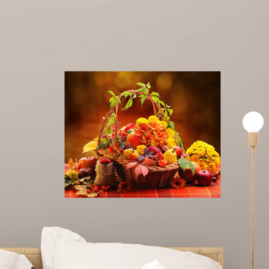 Wicker basket with autumn fruits and flowers Wall Mural